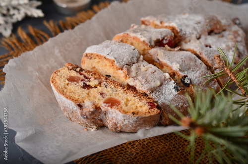 Christmas stollen on white parchment.