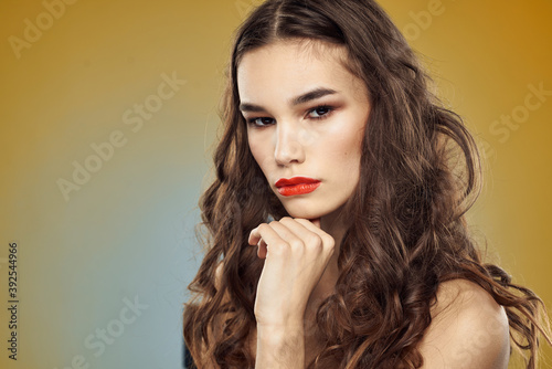 Beautiful glamor woman nude shoulders hairstyle red lips studio