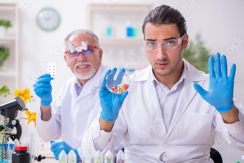 Two chemists working in the lab