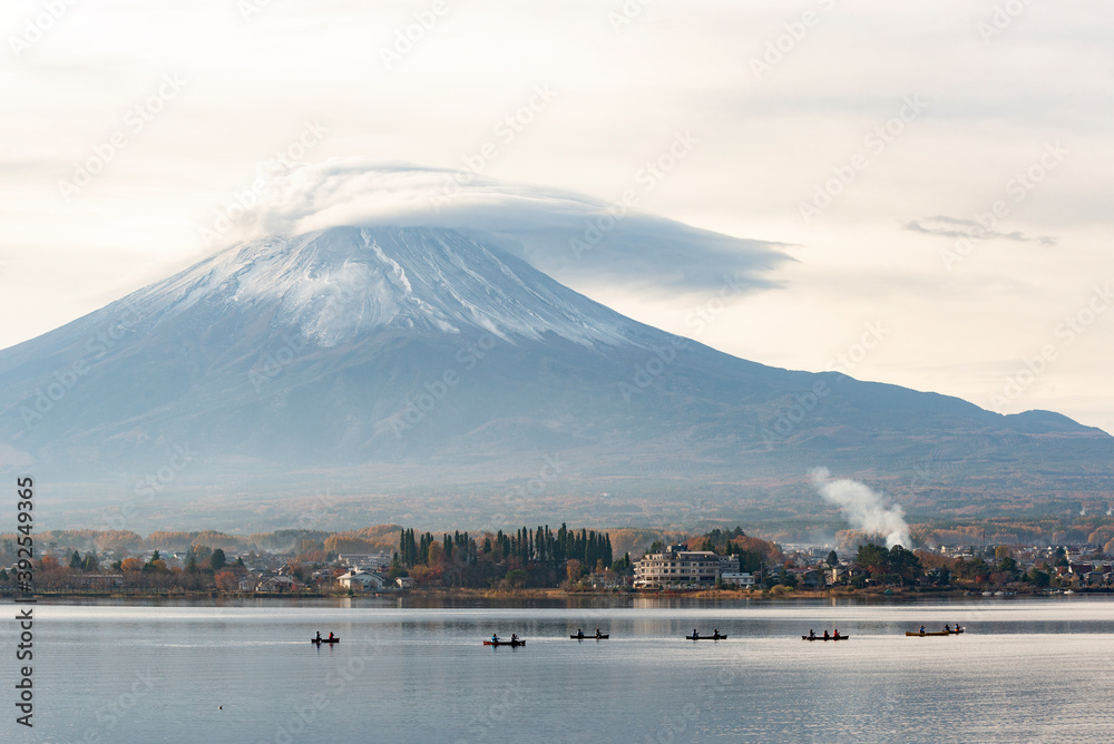 Fuji Mountain with Lenticular Cloud on Top and Tourist Boats at Kawaguchiko Lake, Japan