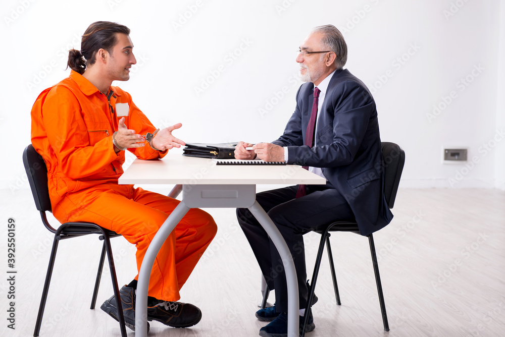 Young captive meeting with advocate in pre-trial detention Young captive meeting with advocate in pre-trial detention