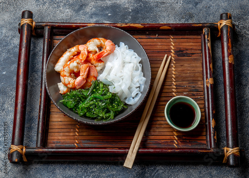 Shirataki noodles, shrimps and seaweed chuka bowl. Healthy low carbs, low calories lanch photo