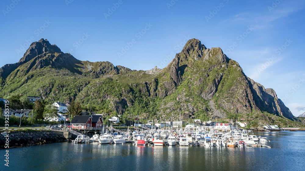 Trondheim, Norway - June 2016: Beautiful nature landscape in Norway with a small harbor and boats Trondheim, Norway - June 2016: Beautiful nature landscape in Norway with a small harbor and boats