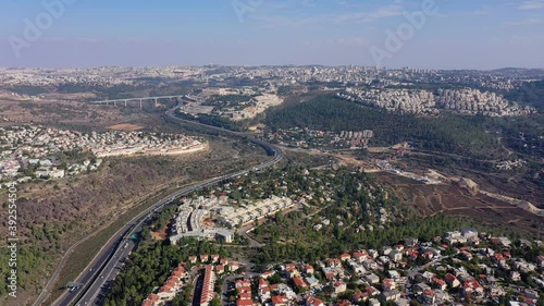 Jerusalem city with tel aviv highway (road one) traffic, Aerial view
Panorama shot with jerusal main entrance, Israel,drone view
 photo