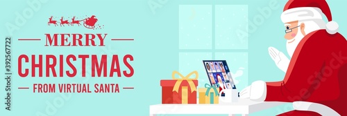 Santa Claus having virtual meeting with children at home.