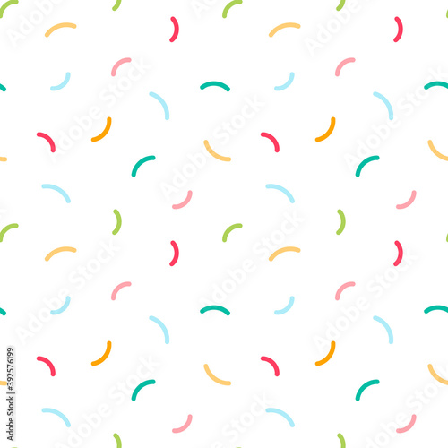 Vector seamless pattern background with bright colorful confetti, sprinkles.
