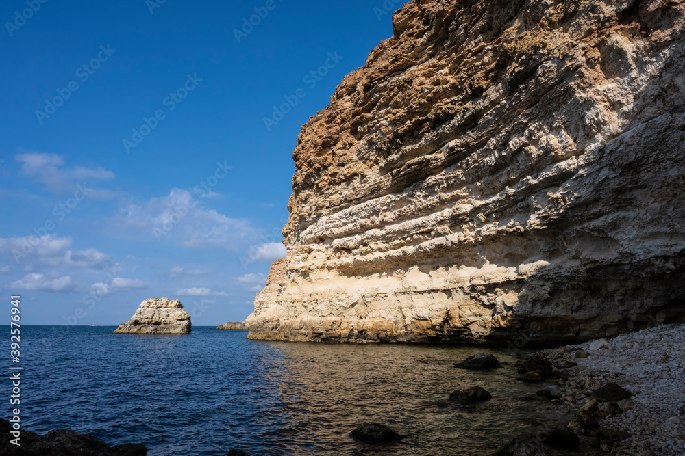 Beach on the shore of a steep Bank. Sevastopol, Republic Of Crimea, Russia. A clear, Sunny morning of 24 September 2020