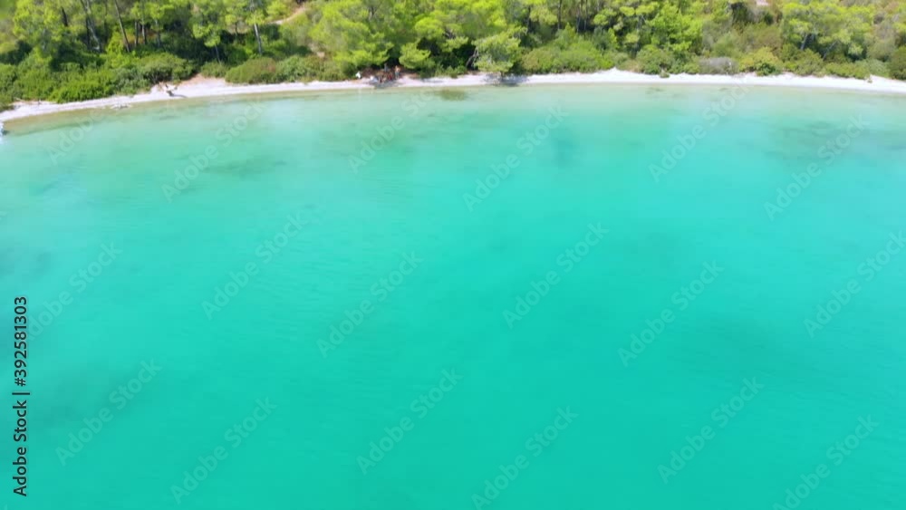 Aerial nature landscape of secret bay of Aegean Sea where green and blue meets. Pure nature with incredible clear green waters on a summer day in Didim, Turkey Aerial nature landscape of secret bay of Aegean Sea where green and blue meets. Pure nature with incredible clear green waters on a summer day in Didim, Turkey