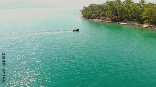 Wallpaper Mural Drone tracking a Speed Boat surrounded by blue Aegean Sea at the Bay of Akbuk in Didim, Turkey Torontodigital.ca