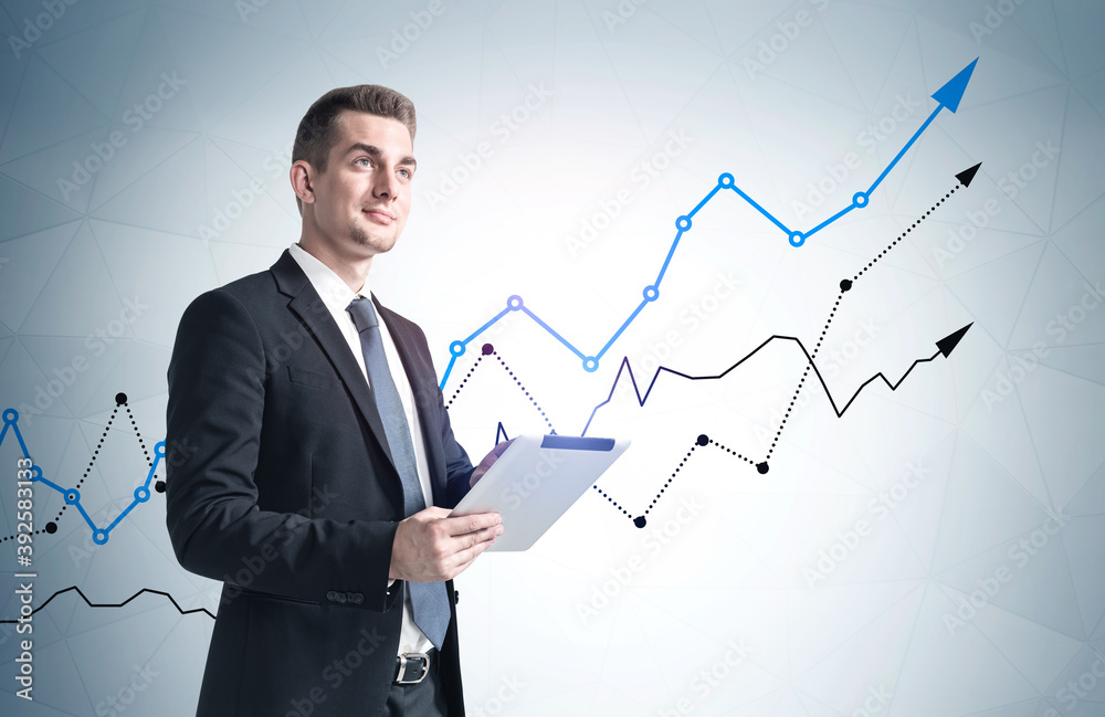 Man with tablet and growing graph Man with tablet and growing graph