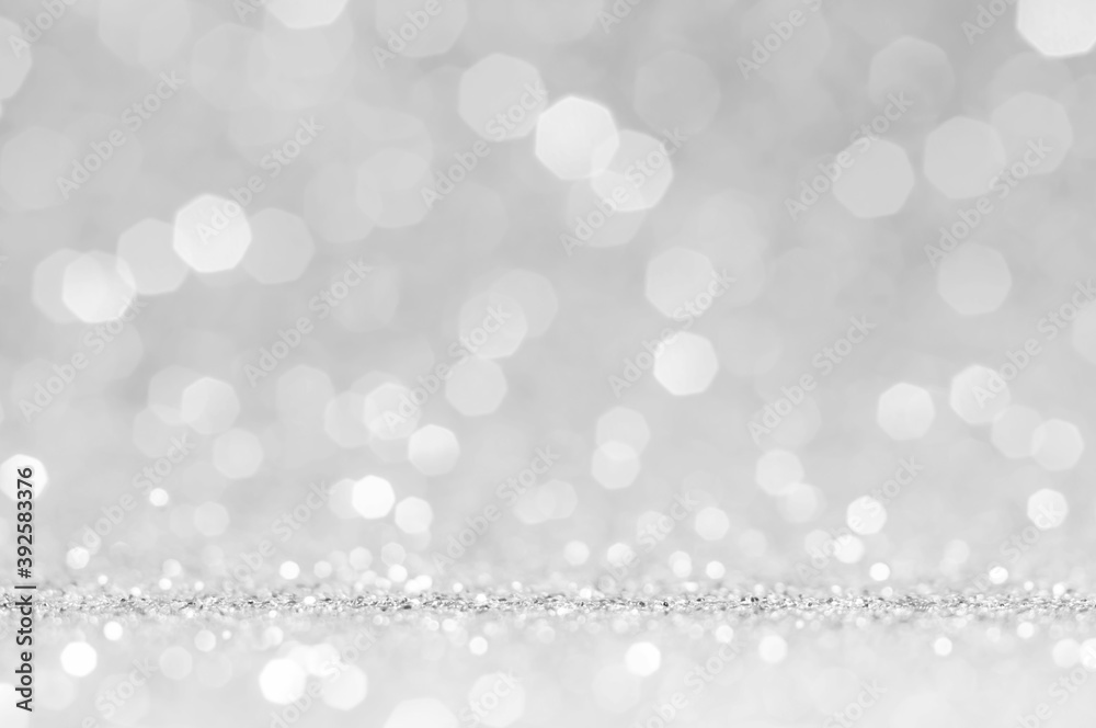 Light grey,white bokeh,circle abstract light background,grey,white shining lights, sparkling glittering Valentines day,women day or event lights romantic backdrop.Blurred abstract holiday background..
