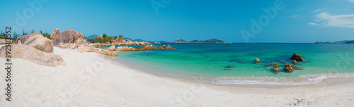 Obraz na płótnie Gorgeous tropical beach turquoise transparent water unique rock boulders, Cam Ranh Nha Trang Vietnam south east coast travel destination, desert beach no people clear blue sky w salonie
