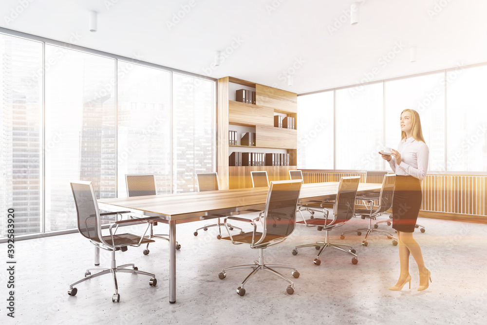 Fototapeta premium Woman in white meeting room