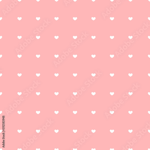 Pink background with cute white hearts polka dot seamless pattern. Valentine's day, love, card, print, tag, label, wallpaper, background, banner, etc. 