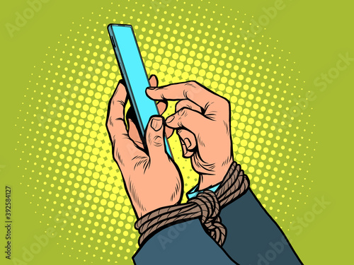Men hands with a smartphone. Tied hands. Internet addiction