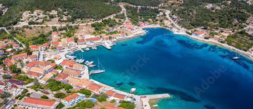 Aerial view to the idyllic village of Fiskardo at the coast of Kefalonia island, Ionian Sea, Greece, a popular marina for tourists and sailors