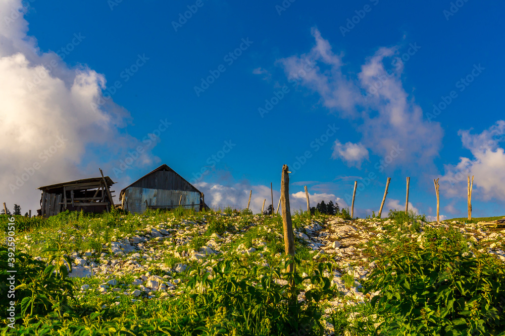Scenery mountain landscape at Caucasus mountains with old hut