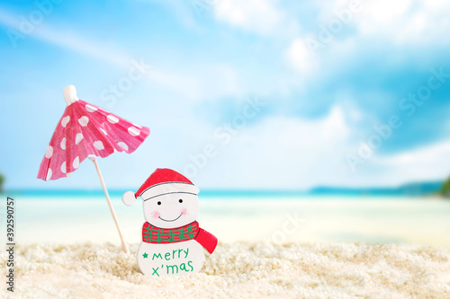 Christmas decoration on sand beach, image for Christmas holiday vacation concept.