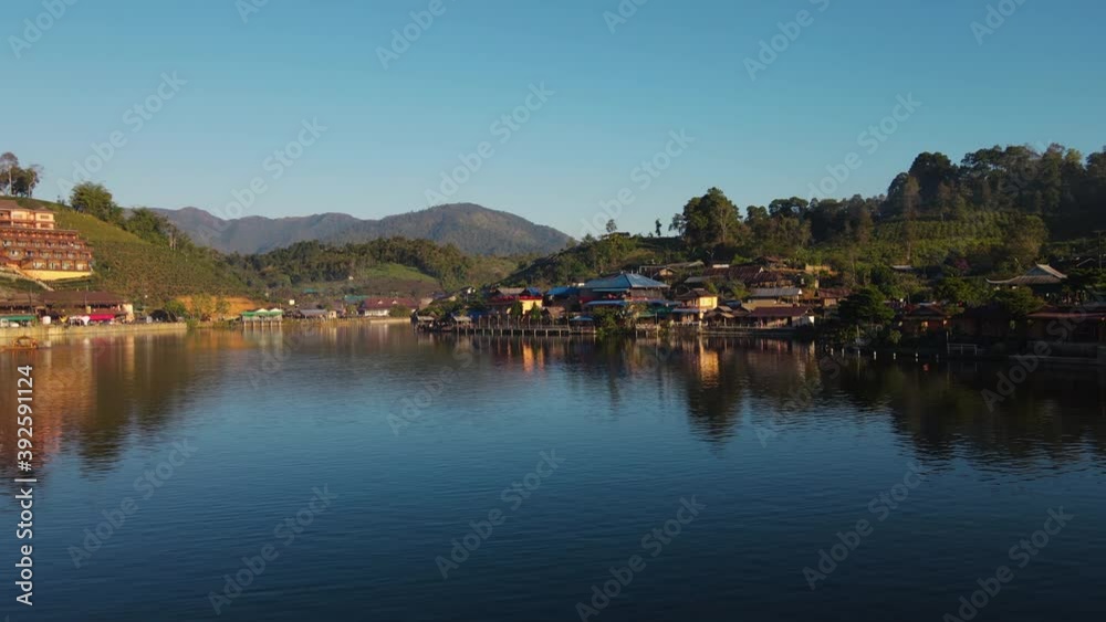 Aerial view pan camera above the beautiful lake at Aerial view pan camera above the beautiful lake at