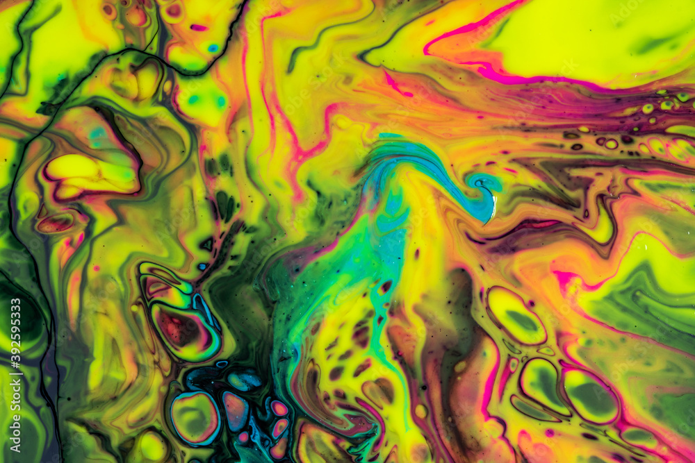 Colorful mix of acrylic vibrant colors. Fluid painting abstract texture.