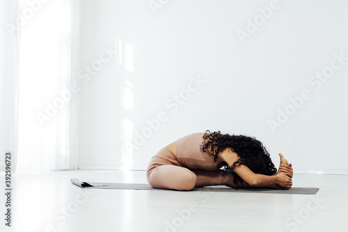 Woman engaged in yoga class asana gymnastics fitness sport