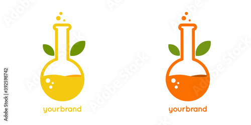 Orange fruit juice logo design template with laboratory flask