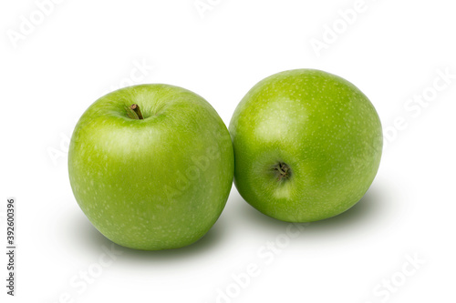 Two ripe green apple fruits isolated on white background with clipping path.