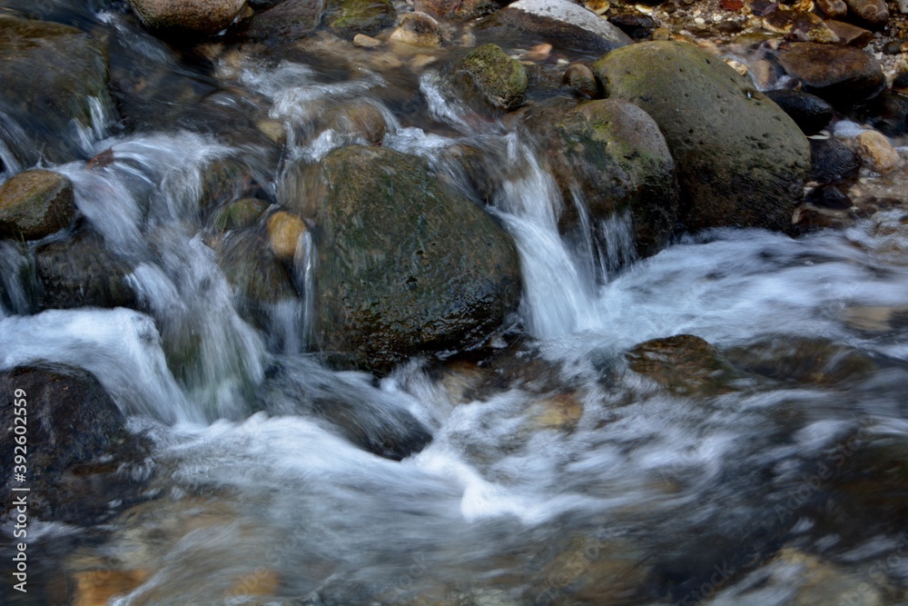 A small cascade of waterfalls on the river. A small cascade of waterfalls on the river.