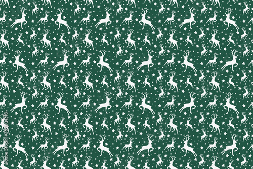 Christmas pattern with reindeers and stars. Vector
