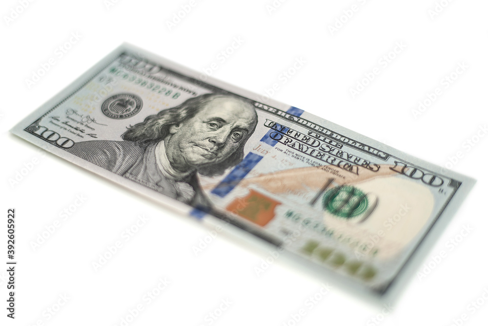 100 Dollars bill and portrait Benjamin Franklin on USA money banknote. Hundred dollar bills on wooden background.. 100 Dollars bill and portrait Benjamin Franklin on USA money banknote. Hundred dollar bills on wooden background..
