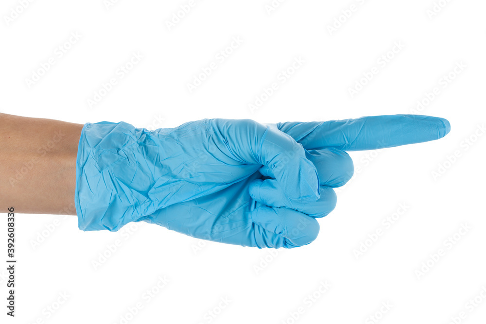 Hand wearing blue glove to protect herself from COVID-19, isolated on white background. Hand wearing blue glove to protect herself from COVID-19, isolated on white background.