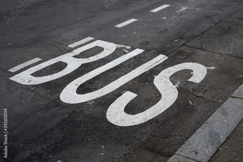 Closeup of bus sign painted on the road © pixarno