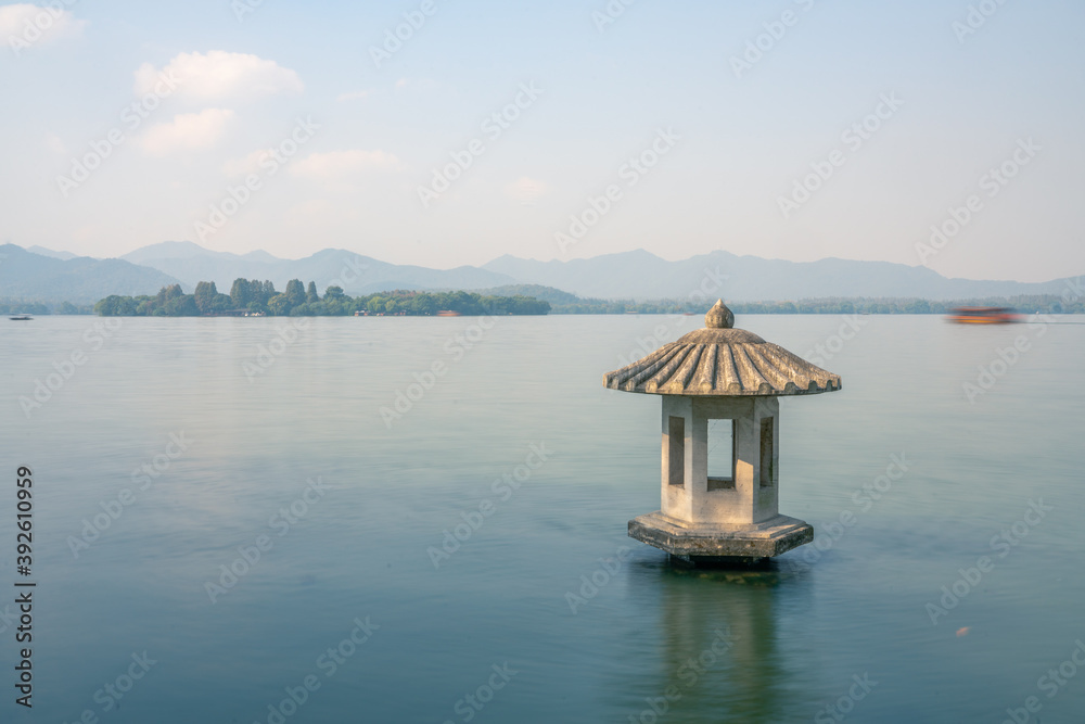 Cuiguang pavilion, the historic landmark in West Lake, in Hangzhou, China. Cuiguang pavilion, the historic landmark in West Lake, in Hangzhou, China.
