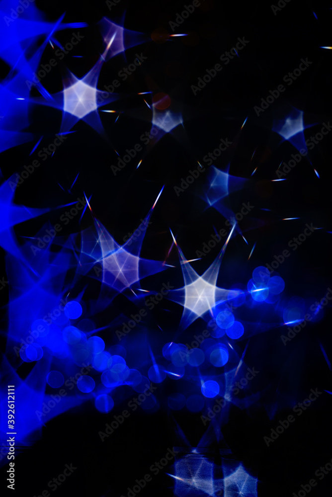 Christmas Abstract blurred pattern of light strands in purple tones as background. Christmas Abstract blurred pattern of light strands in purple tones as background.