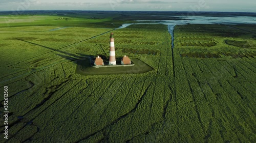 Lighthouse Westerheversand, Germany. Schleswig-Holstein, North Sea. 4K drone.