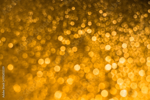 Gold bokeh with black background