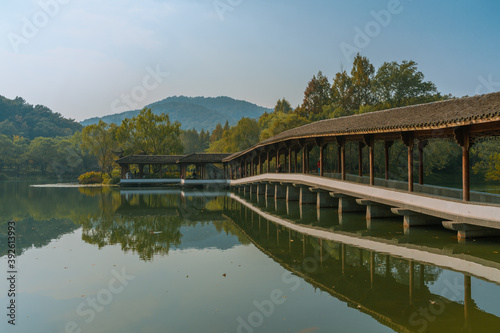 Chinese pavilion at the West lake in Hangzhou, China, autumn time.