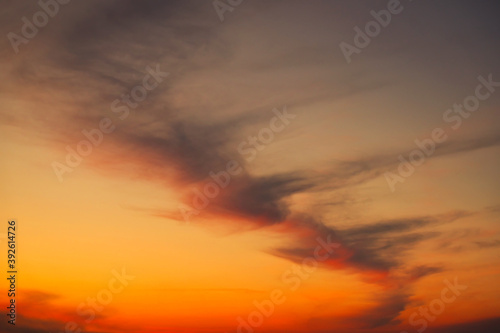 Sky sunset in the evening with colorful orange sunlight. Beautiful majestic nature background