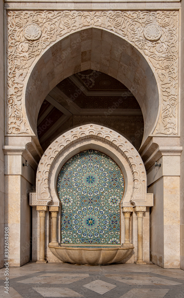 The Hassan II Mosque in Casablanca, Morocco. Ornate exterior fountain. Hassan II Mosque is the largest mosque in Morocco and one of the most beautiful. the 13th largest in the world.