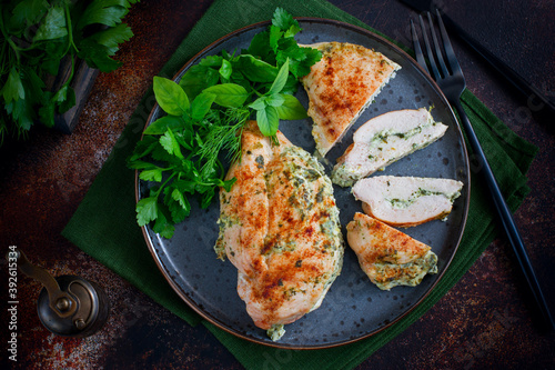 Baked chicken breast stuffed with cheese and spinach, horizontal