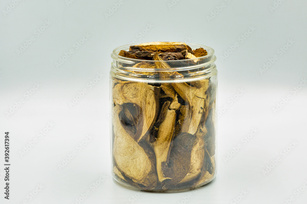 dried mushrooms bay bolete in a jar closeup dried mushrooms bay bolete in a jar closeup