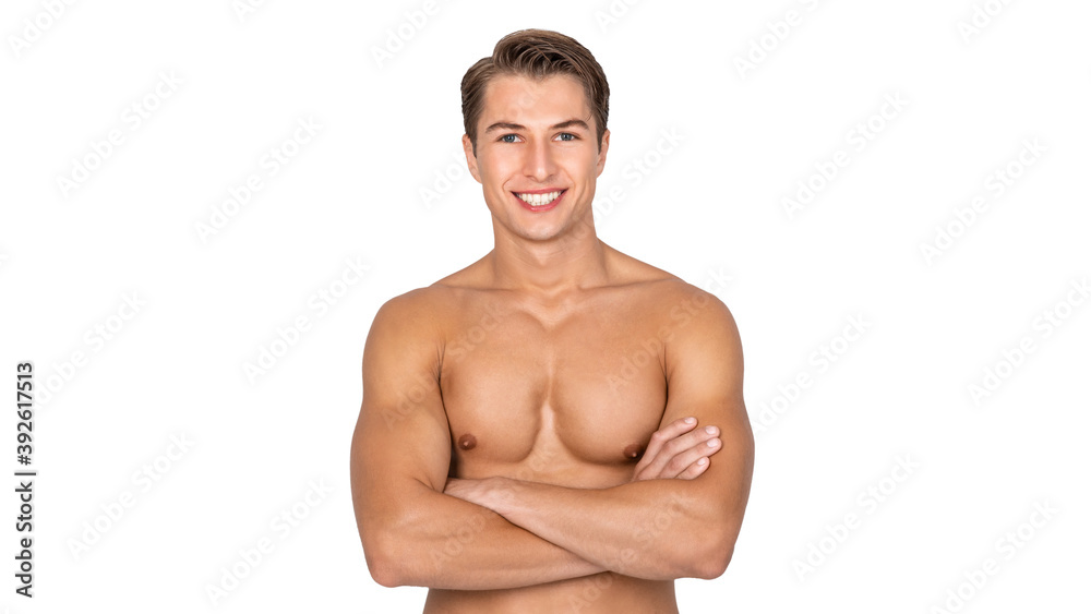 Portrait of guy posing with naked torso at white studio Portrait of guy posing with naked torso at white studio