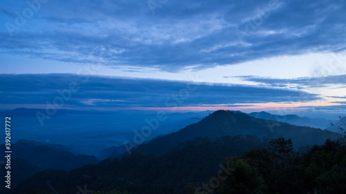 Landscape mountain silhouette at sunrise © flyalone