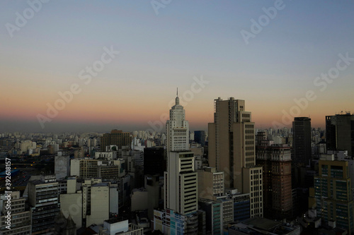 A thick layer of pollution is seen in the horizon during sunset in downtown Sao Paulo  Brazil.
