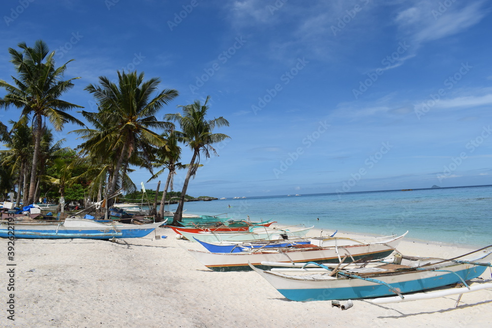 boats on the beach in the island