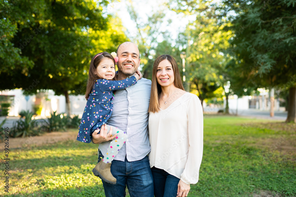 Happy family having a good time outdoors Happy family having a good time outdoors