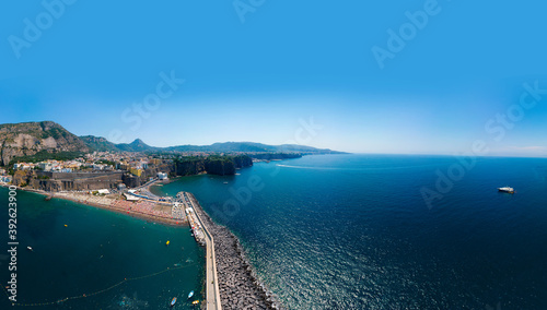Wide panorama. Sorrento coast, Aerial view of the Meta bay. One of the most expensive resorts. beautiful Italy landscape. Sea, luxury boats, mountain tourist city, Vacation and travel. Summer day © Sergey