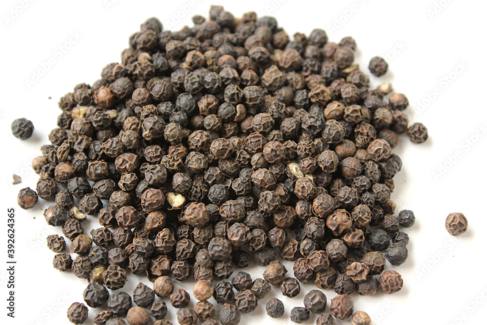 black pepper corns isolated on white background. black pepper corns isolated on white background.