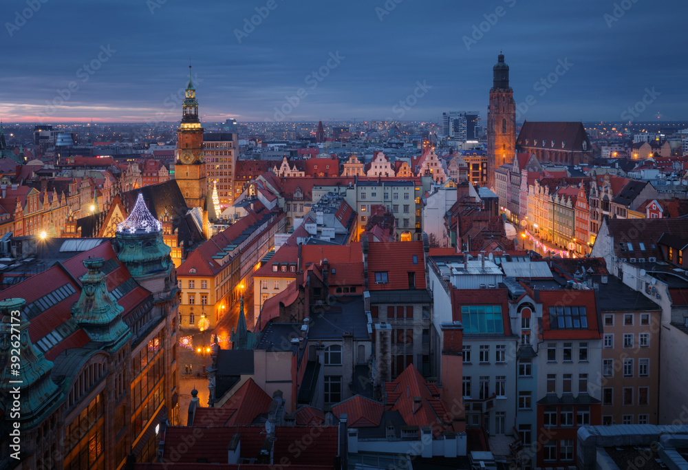 Aerial panorama of illuminated old town part of Wroclaw after the sunset. Poland