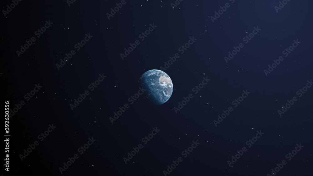 Distant view of planet earth surrounded by the dark blue space and some stars. Day time in the east